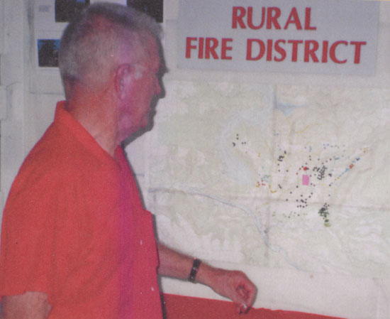 Ed examining map of Fire District.