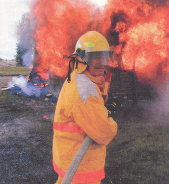 Ed manning the water hose.